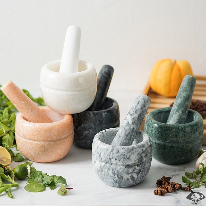 Garlic stone mortar collection in various colors on display.