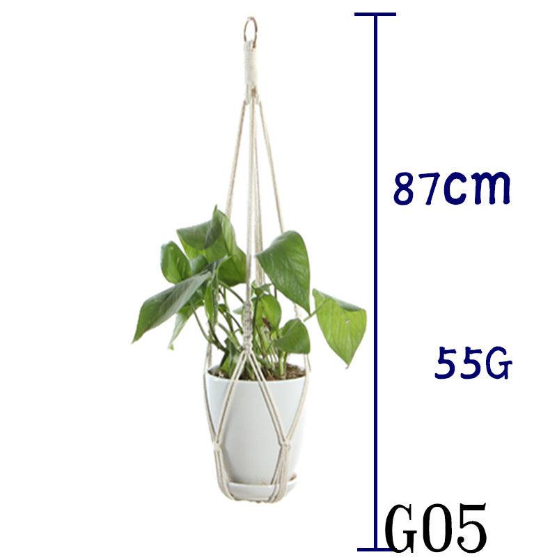 Beige cotton rope plant hanger with a green plant, measuring 87cm in length.
