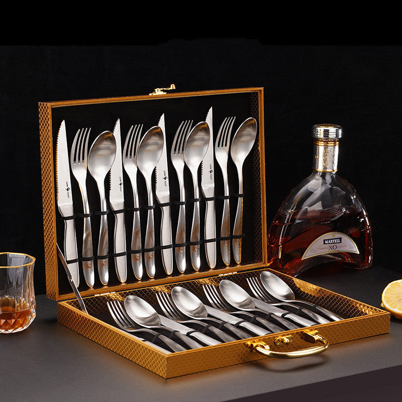 Stainless steel tableware set in a decorative box with forks, knives, and spoons for adults.