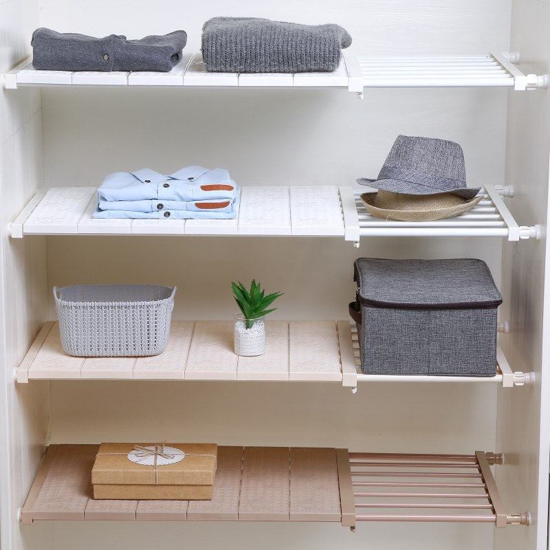 Space-saving adjustable wall-mounted kitchen closet storage rack with clothes and accessories.