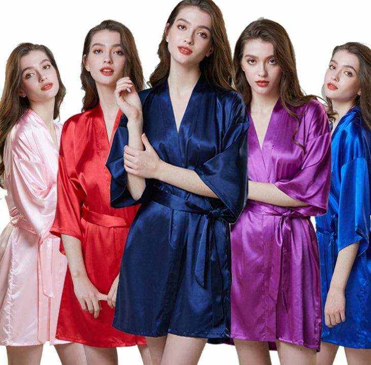Women's silk bath gowns in various colors, including pink, red, blue, purple, and royal blue.