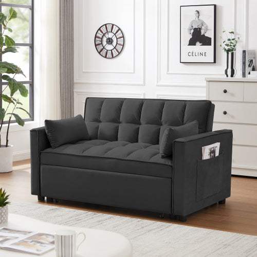 Modern velvet loveseat with pullout bed in black, featuring reclining backrest, toss pillows, and side pockets.