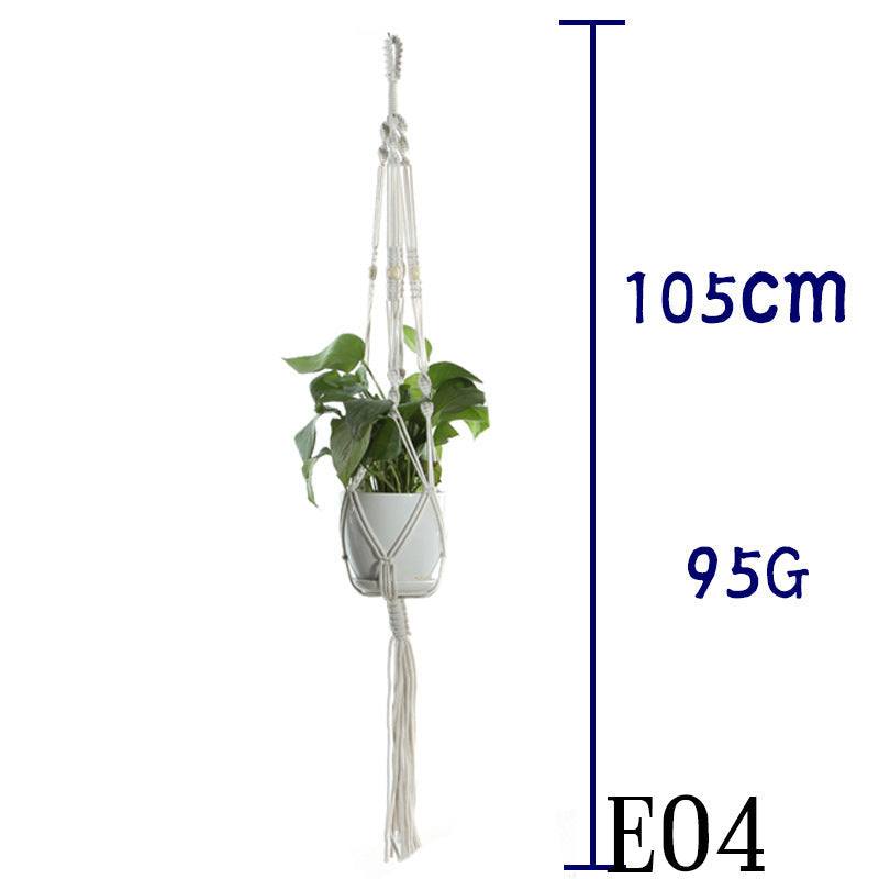 Beige cotton rope plant hanger with greenery.