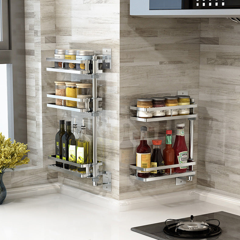 Punch-free kitchen shelf made of 304 stainless steel with modern wall-mounted design.