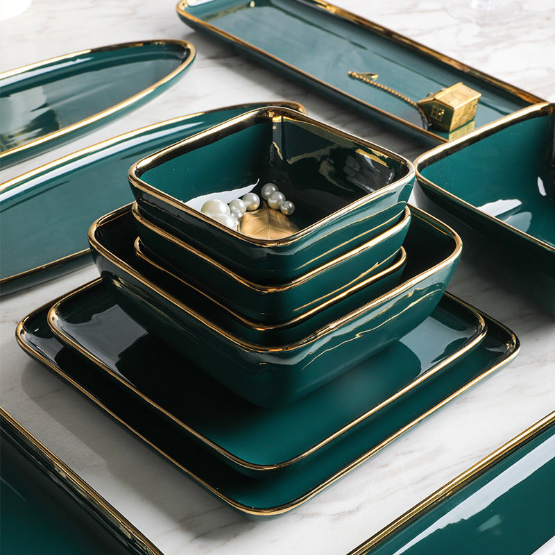 Square Penh Ceramic Tableware set with electroplated edges, including bowls and plates.