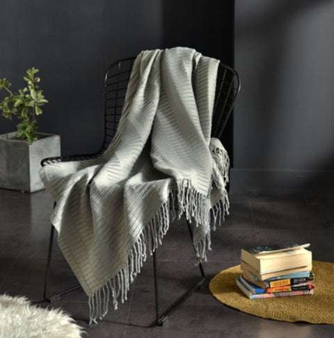Fringed Knitted Napping Blanket in gray on chair, 130x150cm with 10cm tassels.