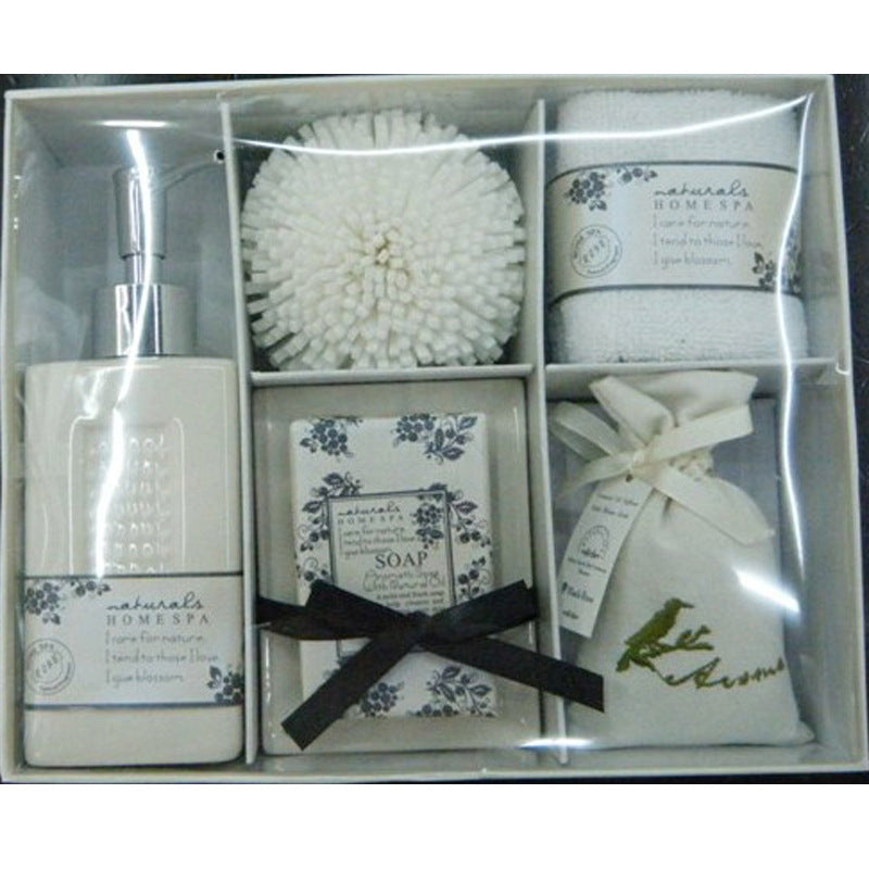 American bathrooms suit bathing accessories gift box with five ceramic pieces, soap, and washcloths.