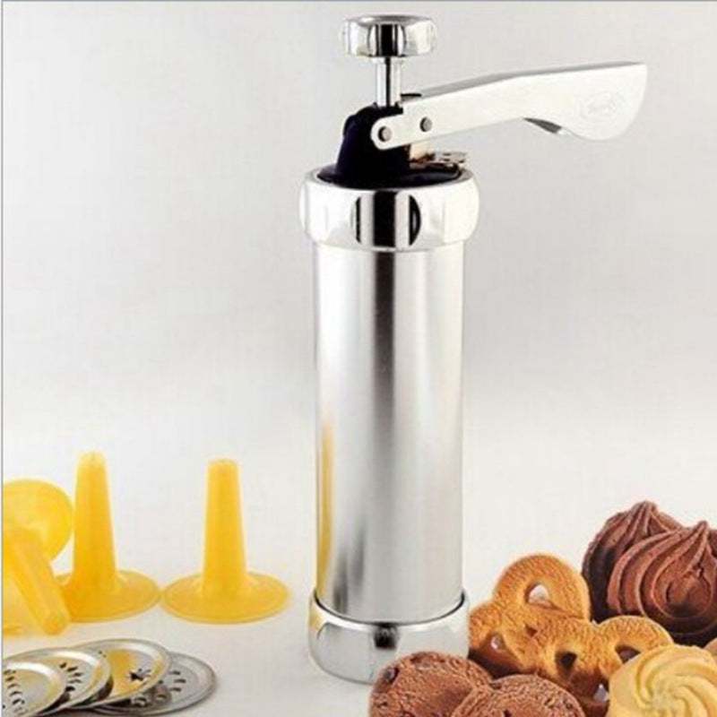 Stainless steel decorating gun with cookie molds for DIY baking.