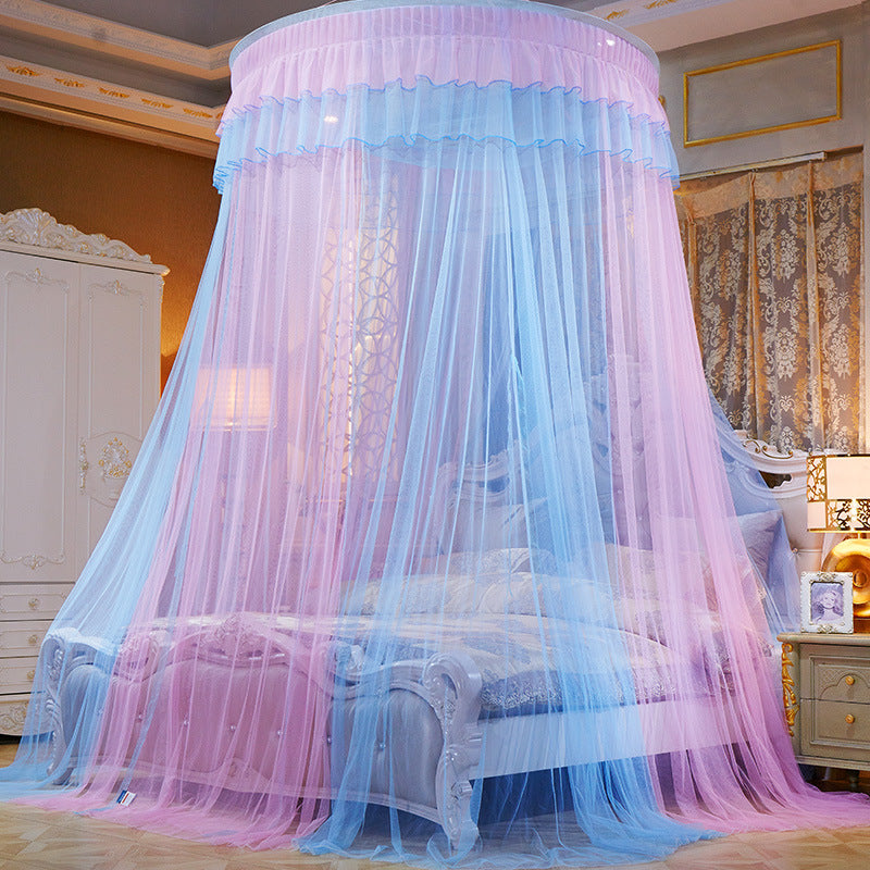 Simple dreamy bed curtain in a soft blue-pink hue, creating a fairy tale ambiance in a cozy bedroom setting.