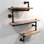 Retro industrial style water pipe shelves with iron and wood construction.
