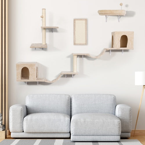 Wall-mounted cat trees with two cat apartments, bridges, and scratching board in beige color above a modern sofa.